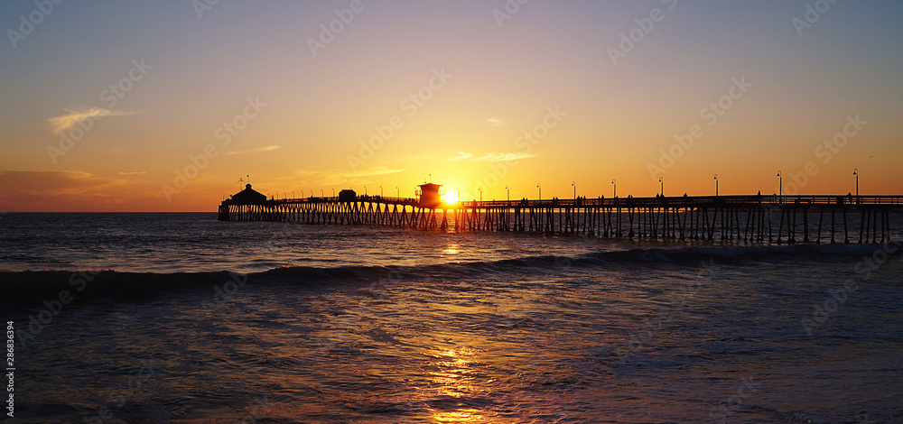 Sunset over pier in San Diego