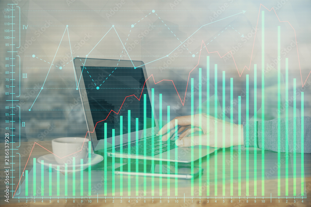 Double exposure of man's hands writing notes of stock market with forex graph background. Concept of research and trading. Double exposure of man's hands writing notes of stock market with forex graph background. Concept of research and trading.