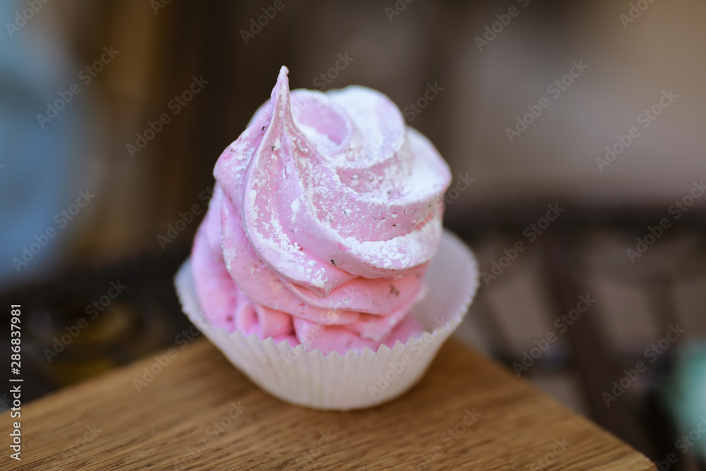 fresh baked cupcake with cream
