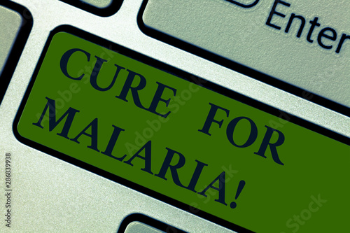 Handwriting text Cure For Malaria. Concept meaning like Primaquine drug used against malaria for prevention Keyboard key Intention to create computer message pressing keypad idea photo