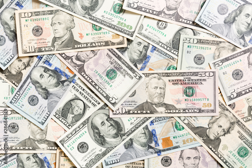 Top view of various dollar cash background. Different banknotes concept. Wealth and rich concept Top view of various dollar cash background. Different banknotes concept. Wealth and rich concept