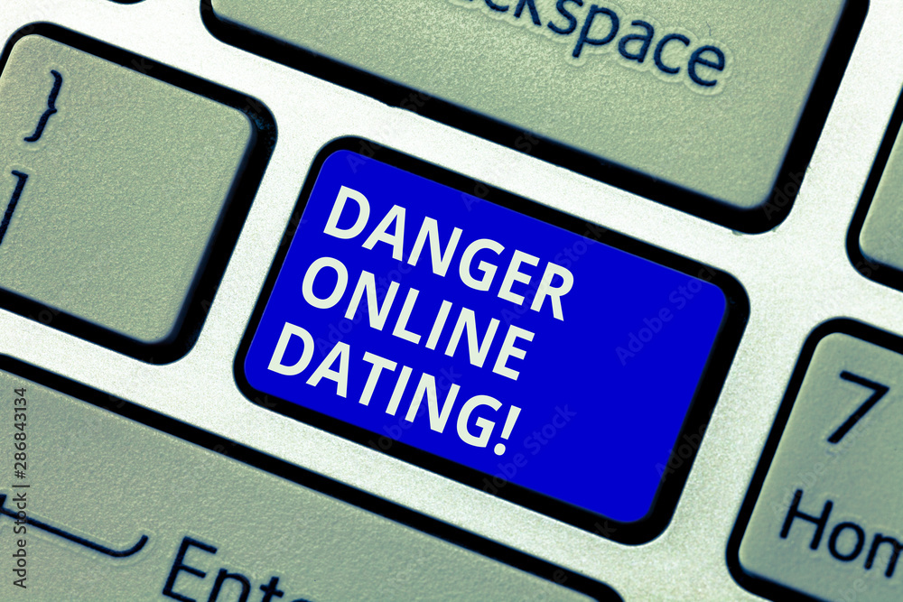 Text sign showing Danger Online Dating. Conceptual photo The risk of meeting or dating demonstrating meet online Keyboard key Intention to create computer message pressing keypad idea