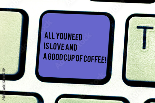 Writing note showing All You Need Is Love And A Good Cup Of Coffee. Business photo showcasing Roanalysisce with hot beverages Keyboard key Intention to create computer message pressing keypad idea photo