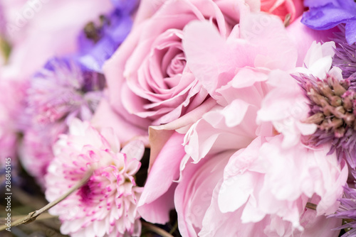 Close-up of beautiful flowers of roses and chrysanthemums in a bouquet for the holiday