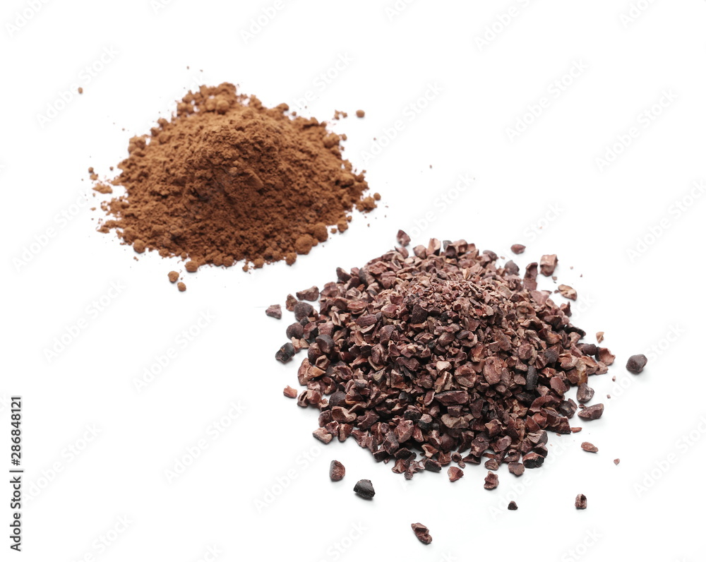 Chopped and powder cocoa pile isolated on white background Chopped and powder cocoa pile isolated on white background