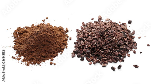 Chopped and powder cocoa pile isolated on white background