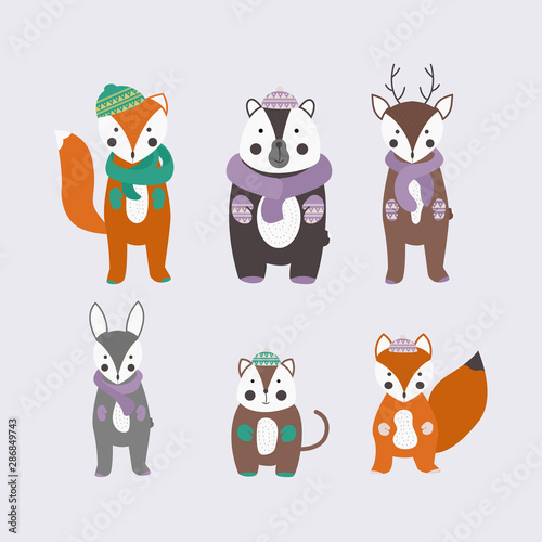 Fototapeta Naklejka Na Ścianę i Meble -  Scandinavian style animals in the winter clothes. Cute vector animals set.