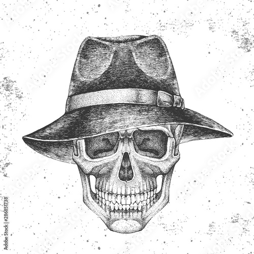 Hand drawing hipster skull with hat on grunge background. Hipster fashion style