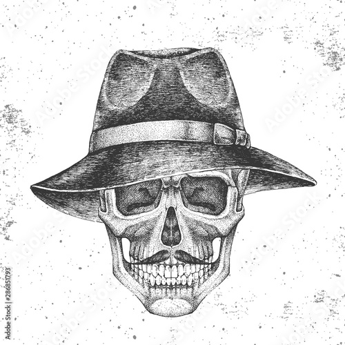Hand drawing hipster skull with hat on grunge background. Hipster fashion style
