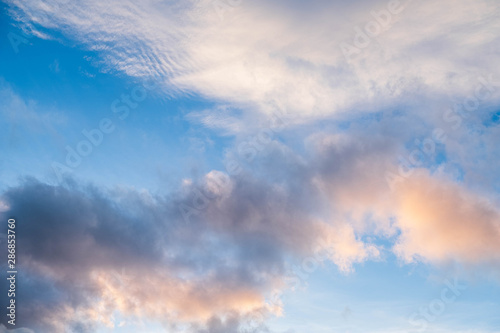 Fototapeta Naklejka Na Ścianę i Meble -  Clouds near sunset before rain blue sky