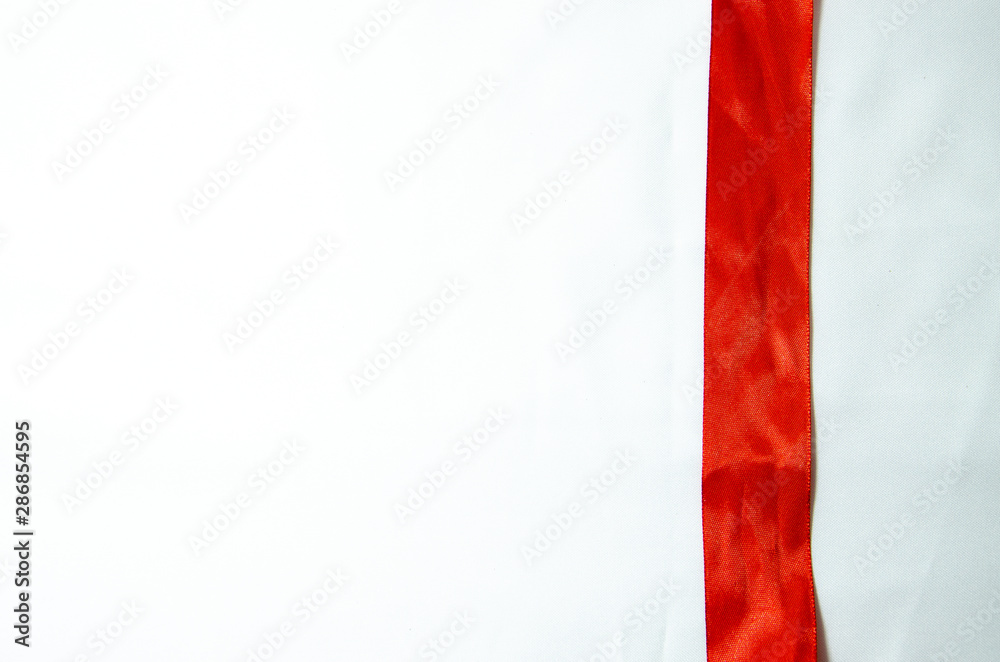 red ribbon on a white background red ribbon on a white background