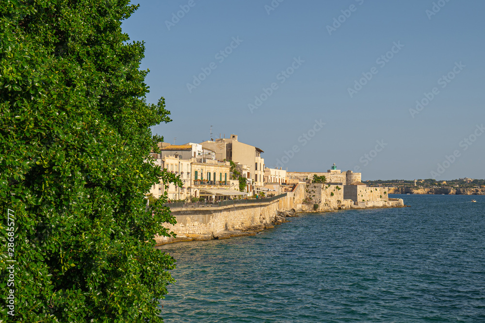 Syracuse, Sicily. Beautiful view of the Ionian Sea coastline in Ortigia, Italy Syracuse, Sicily. Beautiful view of the Ionian Sea coastline in Ortigia, Italy