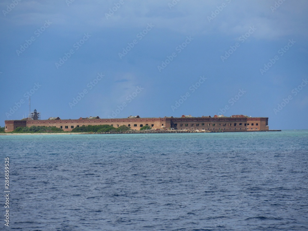 Wide shot of Fort Jefferson viewed from a distance at the Dry Tortugas National Park.