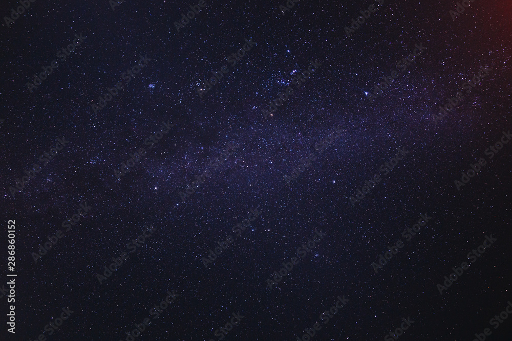 View of milky way galaxy with stars on a night sky background