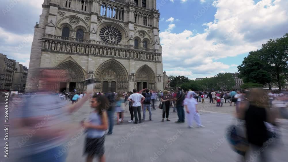 Paris Hyperlapse - Notre Dame Cathedral. Many tourists in front of the stunning cathedral