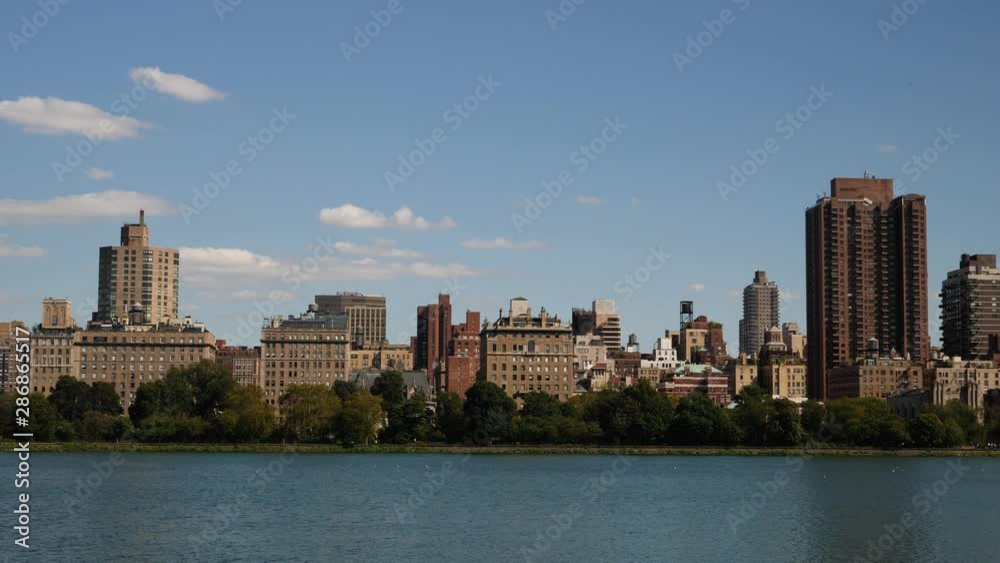 Buildings seen from across the Reservoir within NYC's Central Park.