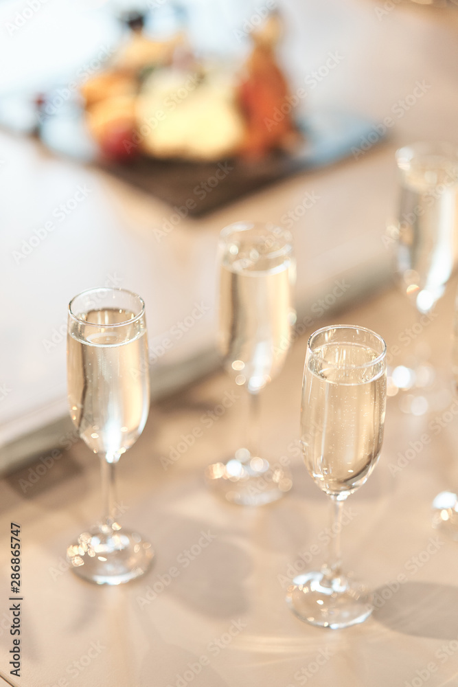 glass goblets with champagne. wedding ceremony, new year