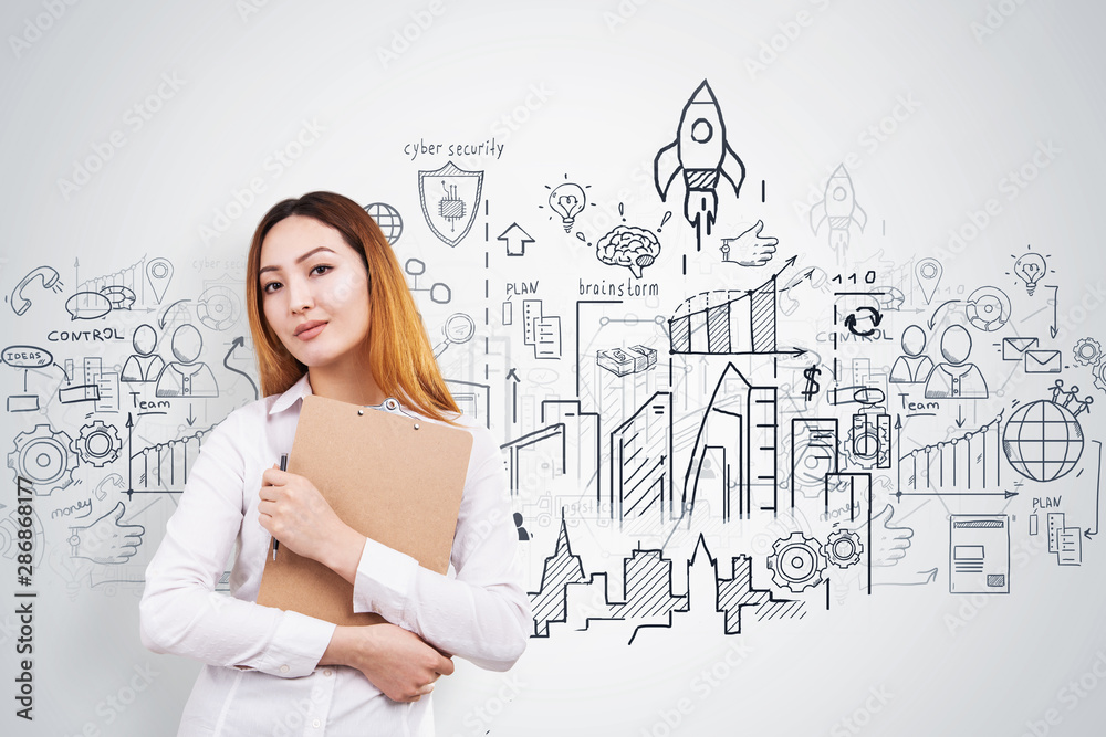 Young Asian woman and her business plan