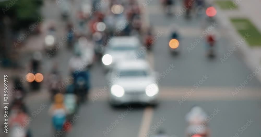 Traffic jam and rush hour in Vietnam. Slow moving traffic with lots of vehicles transport on the road in office hours. Stock footage defocus of urban infrastructure problem, traffic congestion Asia Traffic jam and rush hour in Vietnam. Slow moving traffic with lots of vehicles transport on the road in office hours. Stock footage defocus of urban infrastructure problem, traffic congestion Asia