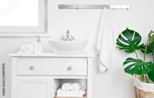 Принти на полотні Simple bathroom cabinet with various supplies