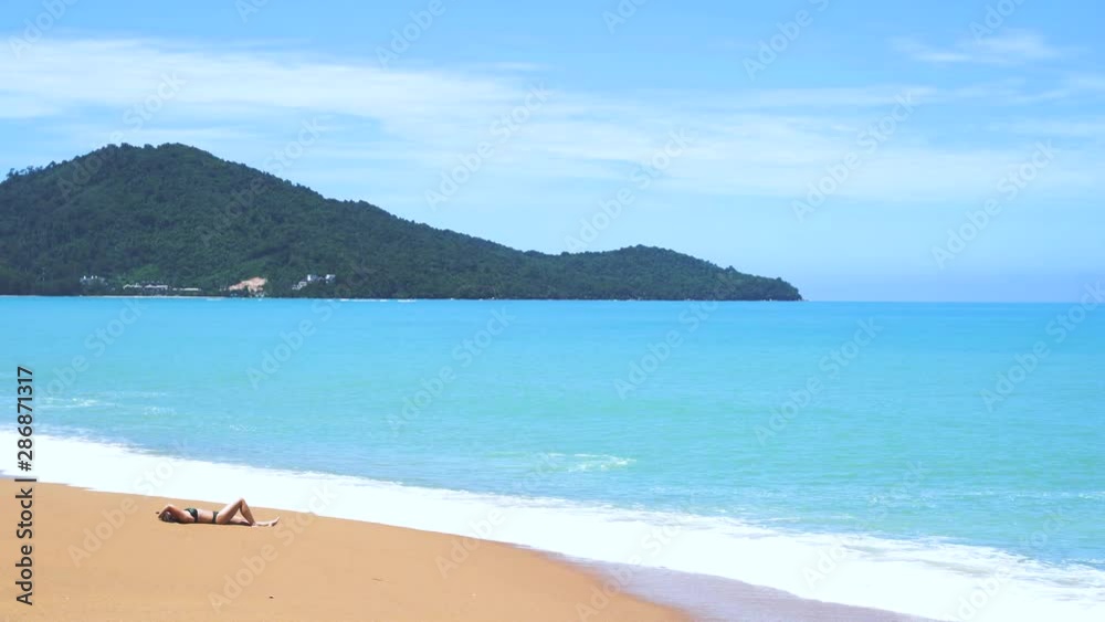Tropical beach afternoon view, of the plane is down near the airport. tropical white sand beach. Sea waves seamless loop on the beautiful sand beach comfortable to the eyes, relax,Phuket Thailand. Tropical beach afternoon view, of the plane is down near the airport. tropical white sand beach. Sea waves seamless loop on the beautiful sand beach comfortable to the eyes, relax,Phuket Thailand.