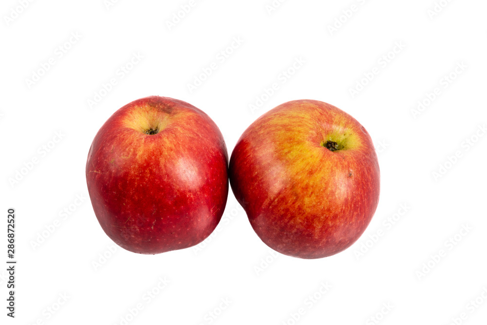 two red apples on a white background two red apples on a white background