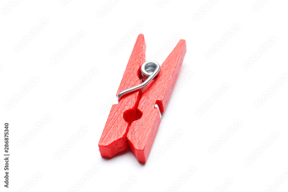 Red clothespin isolated on a white background. Red clothespin isolated on a white background.