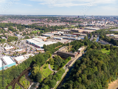 Aerial photo of the town of Armley located in Leeds West Yorkshire in the UK, showing a typical British town on a bright sunny day. © Duncan