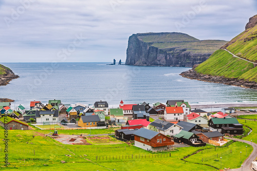 Tjornuvik Beautiful Scandinavian Village, Located On The Faroe Islands, sit on the north coast of Streymoy, photo