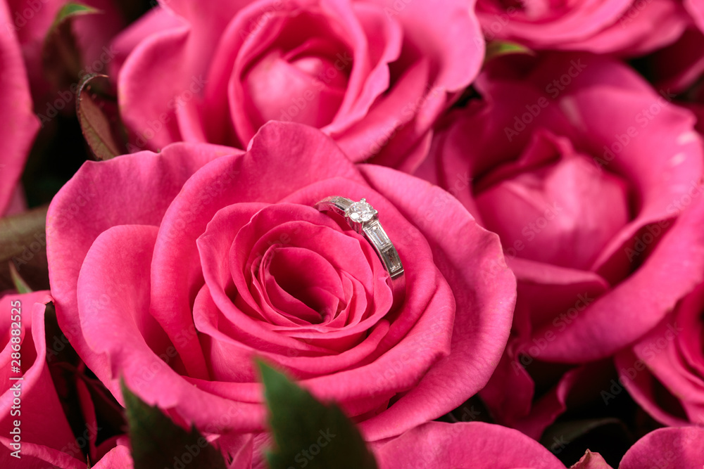 beautiful large bouquet of pink roses with a wedding ring beautiful large bouquet of pink roses with a wedding ring
