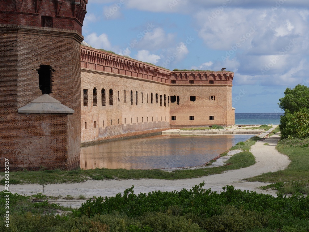 Fort Jefferson with the moat at the Dry Tortugas National Park, one of the tourist destinations in Key West, Florida.