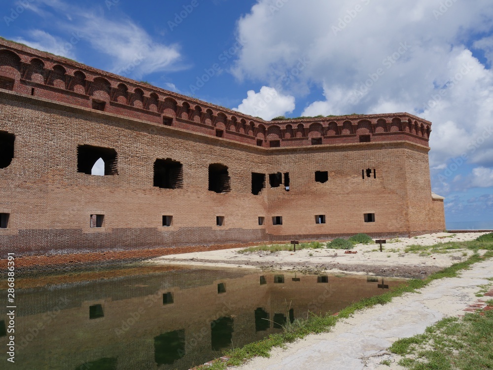 One side of Fort Jefferson with the moat protecting it, Dry Tortugas National Park in Florida.