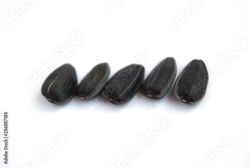 Fotografie Sunflower seeds. Isolated. Close-up. There is a place for text.