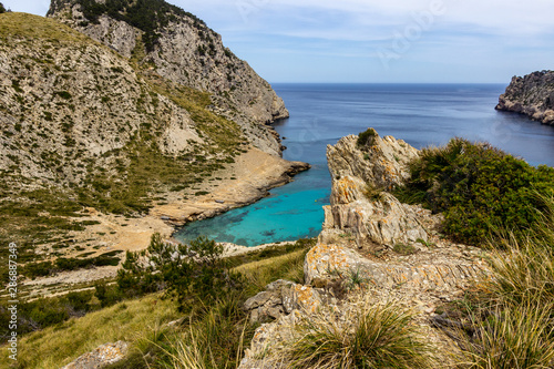 Scenic view on wonderful  rocky bay Cala Figuera on balearic island Mallorca  Spain on a sunny day with clear turquoise water in different colors