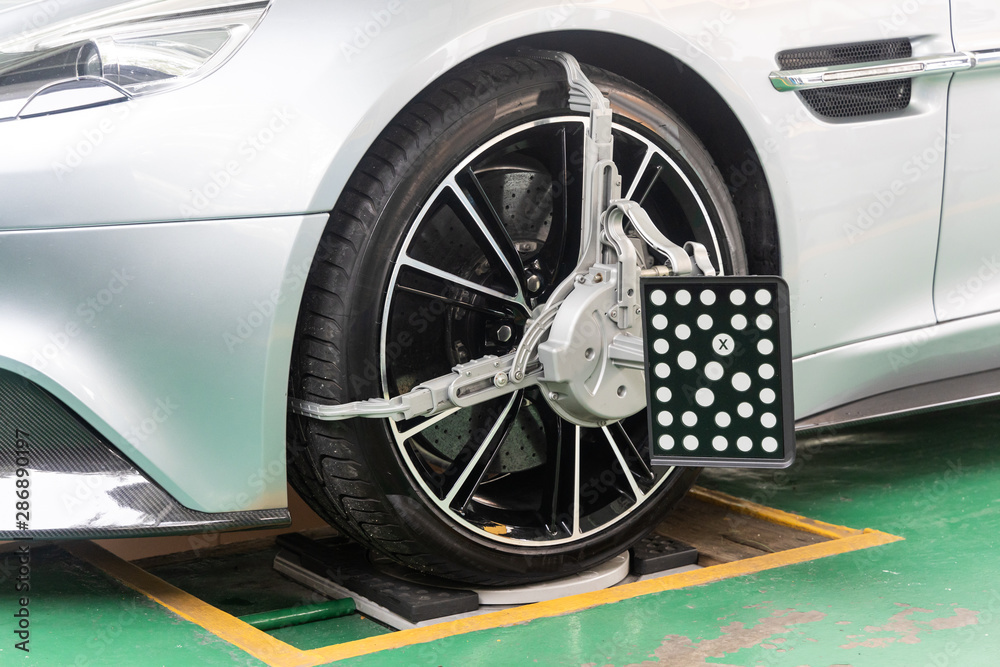 Car wheel clamp with wheel align device for wheel alignment Stock Photo