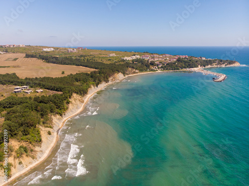 Aerial photo of the beautiful small town and seaside resort of known as Obzor in Bulgaria taken with a drone on a bright sunny day showing the beach and ocean sea front.