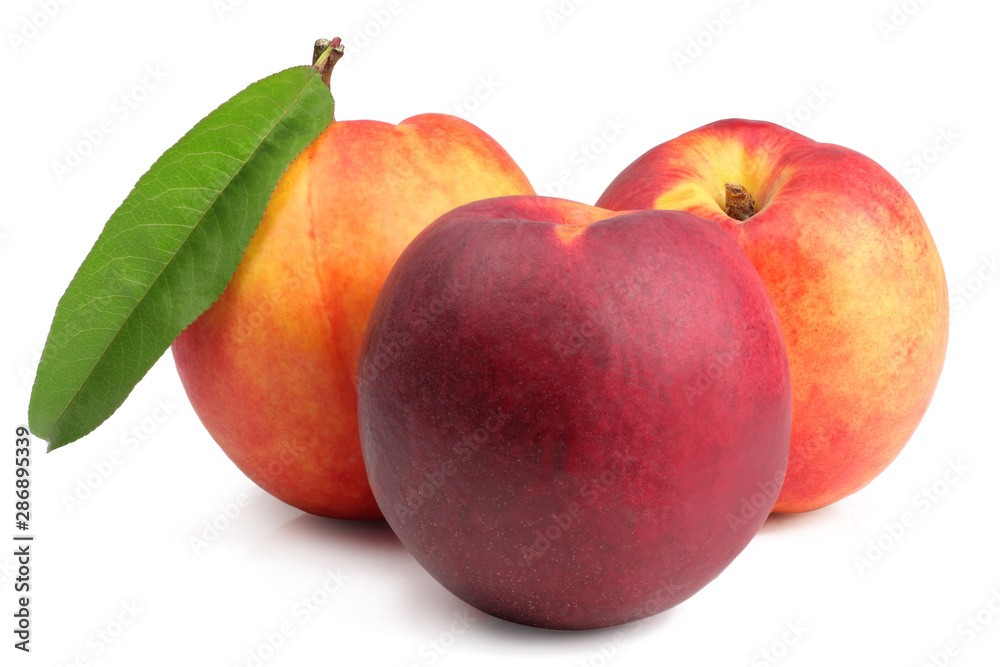Nectarine with green leaf isolated on white Nectarine with green leaf isolated on white