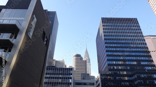 New York City Buildings With Blue Sky Background