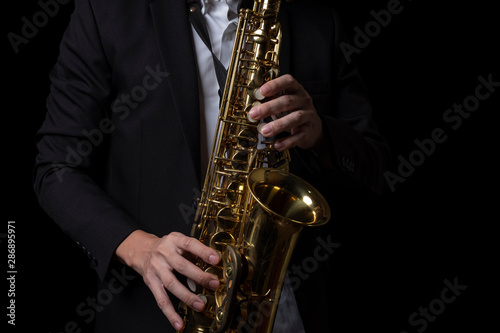 Male Jazz Saxophone Player Performance on the Stage.