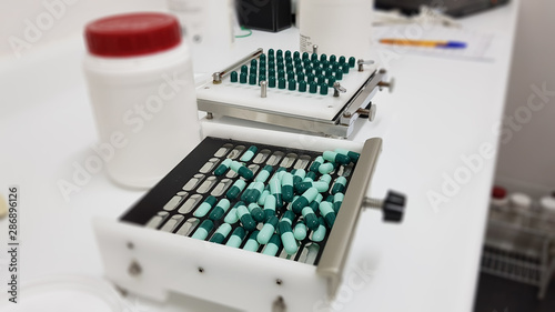 Manufacture of capsules in a pharmacy prescription laboratory