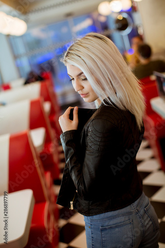 Young woman standing in the...