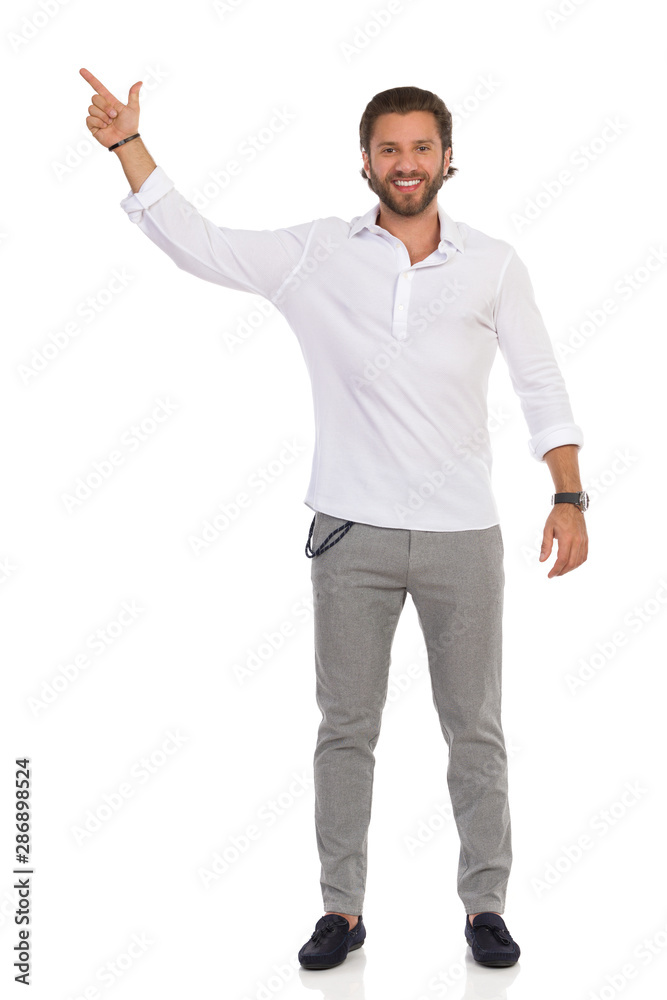 young man pointing at something young man pointing at something