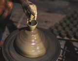 Clay Pots on Pottery Wheel