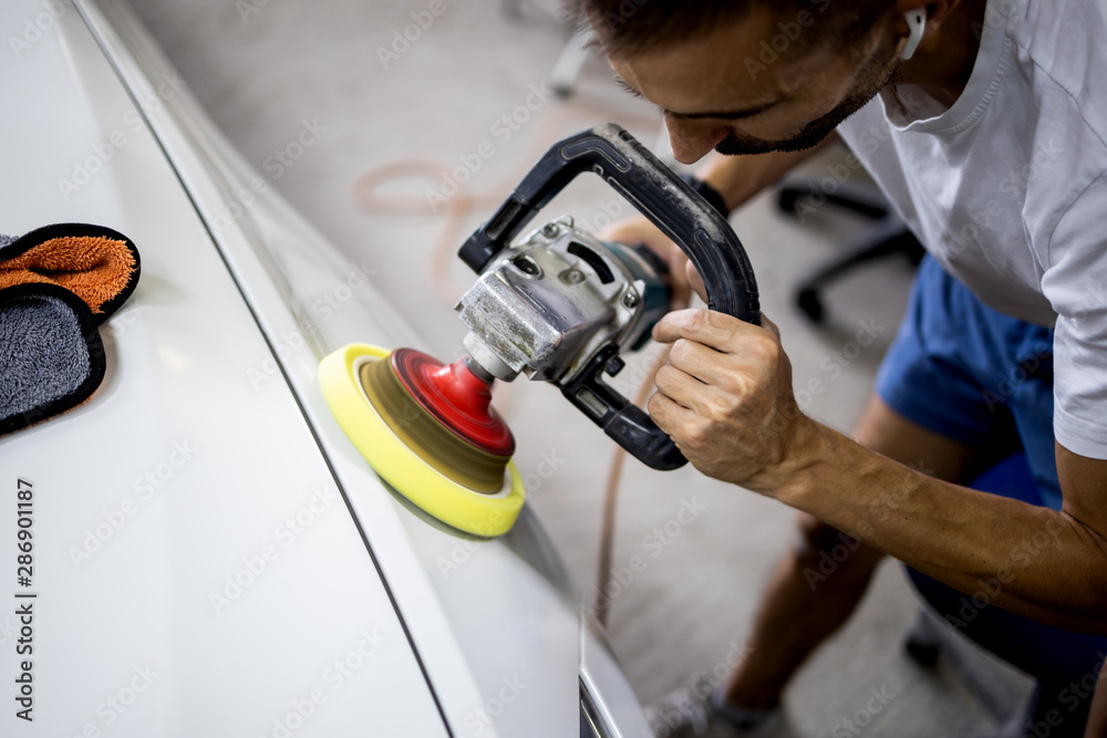 Car polishing details in workshop stock photo