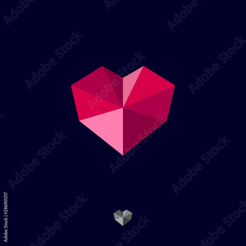 Stone heart icon. Faceted red crystal like heart on a dark background.  Ruby gem.