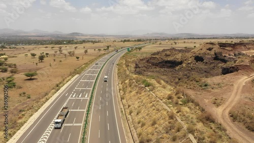 China Africa relations - aerial view of modern Chinese built freeway between Adama and Addis Ababa, infrastructure development and transportation in Ethiopia photo