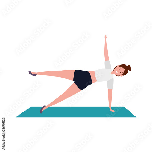 beauty woman practicing pilates position in mattress