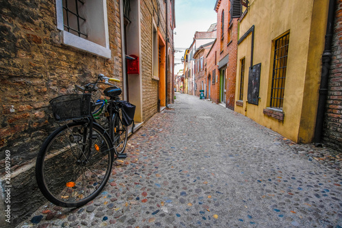 Ferrara  Italy - July     2019  bycicle on a strett of Ferrara   Italy
