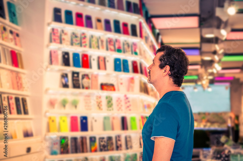 man choosing a fashion cover to protect his smart phone