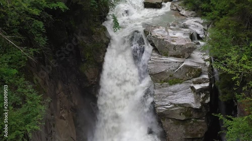 aerial tracking that runs along the course of a mountain waterfall